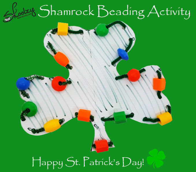 Shamrock beading activity. A white shamrock outlined with large beads and pipe cleaners. toddler toys, toddler, St. Patrick's, St Patrick, Skoolzy, shamrocks, shamrock, Saint Patrick, preschool, pre school, preschooler, pipe cleaner, pipe cleaners, occupa